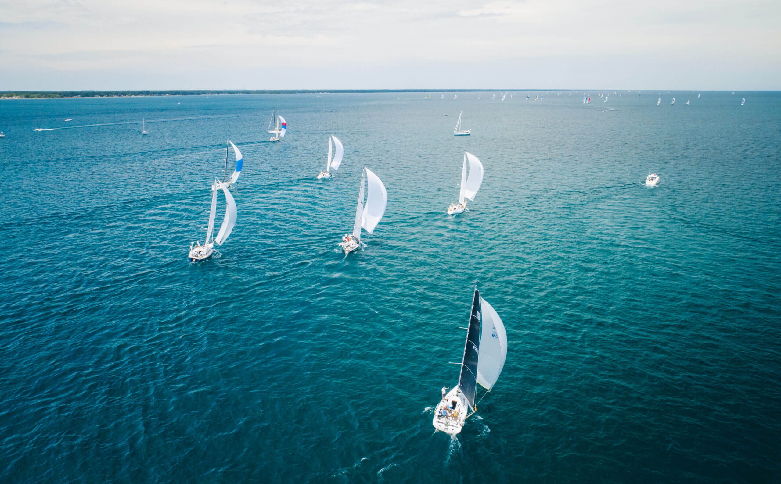 Overview of sailboats racing in the Bayview Mackinac Race.