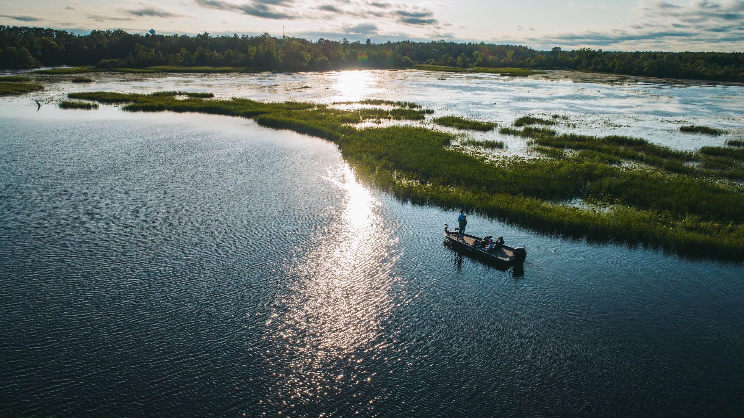 Aerial of small boat in the waters of the Alpena Wildlife Sanctuary