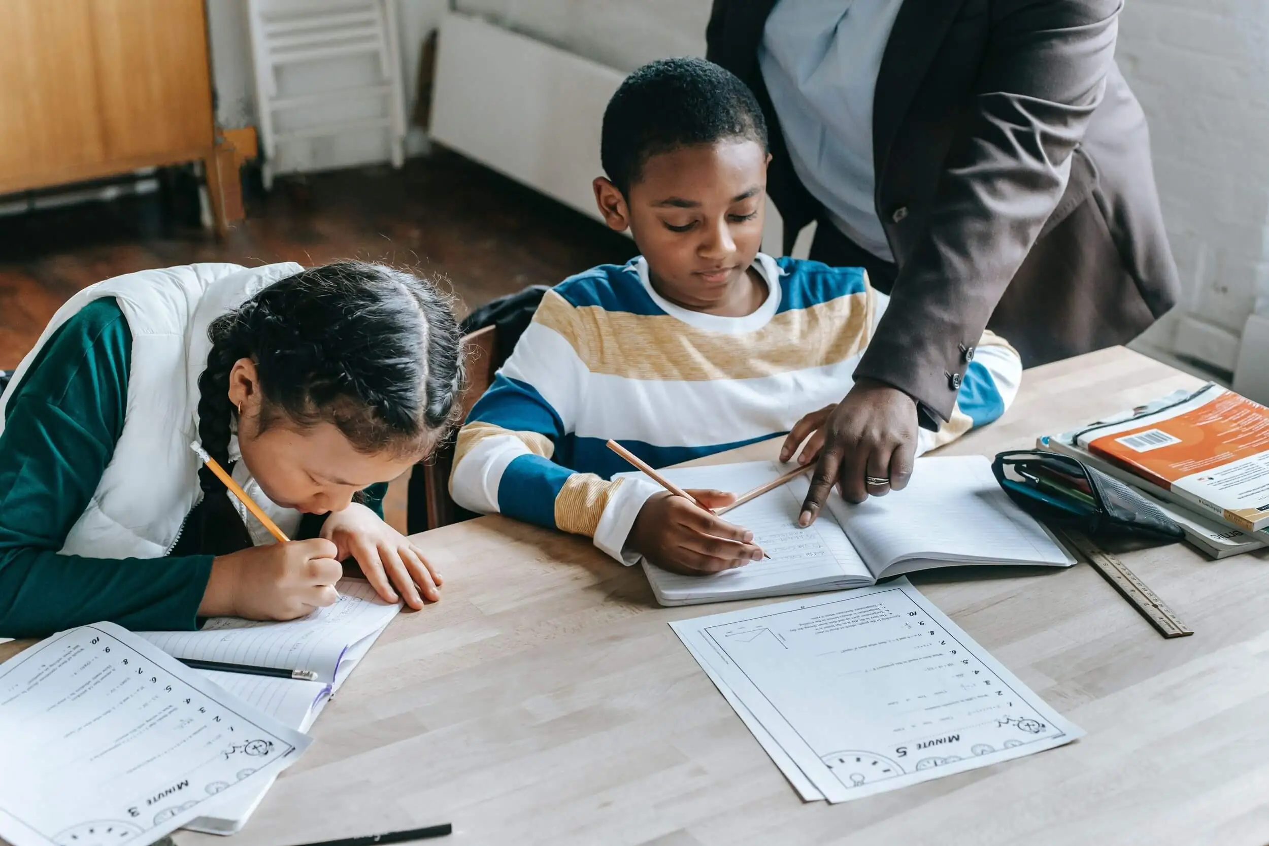 Two students work on their homework.