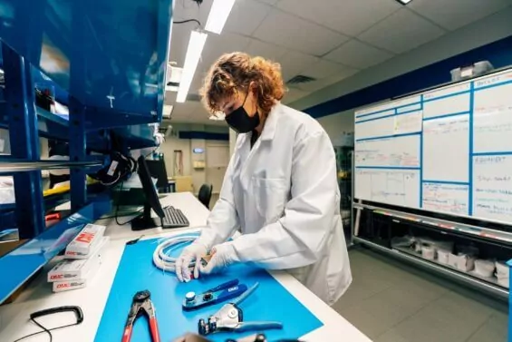 Young female engineer works in the lab at Orbion Space Technology.